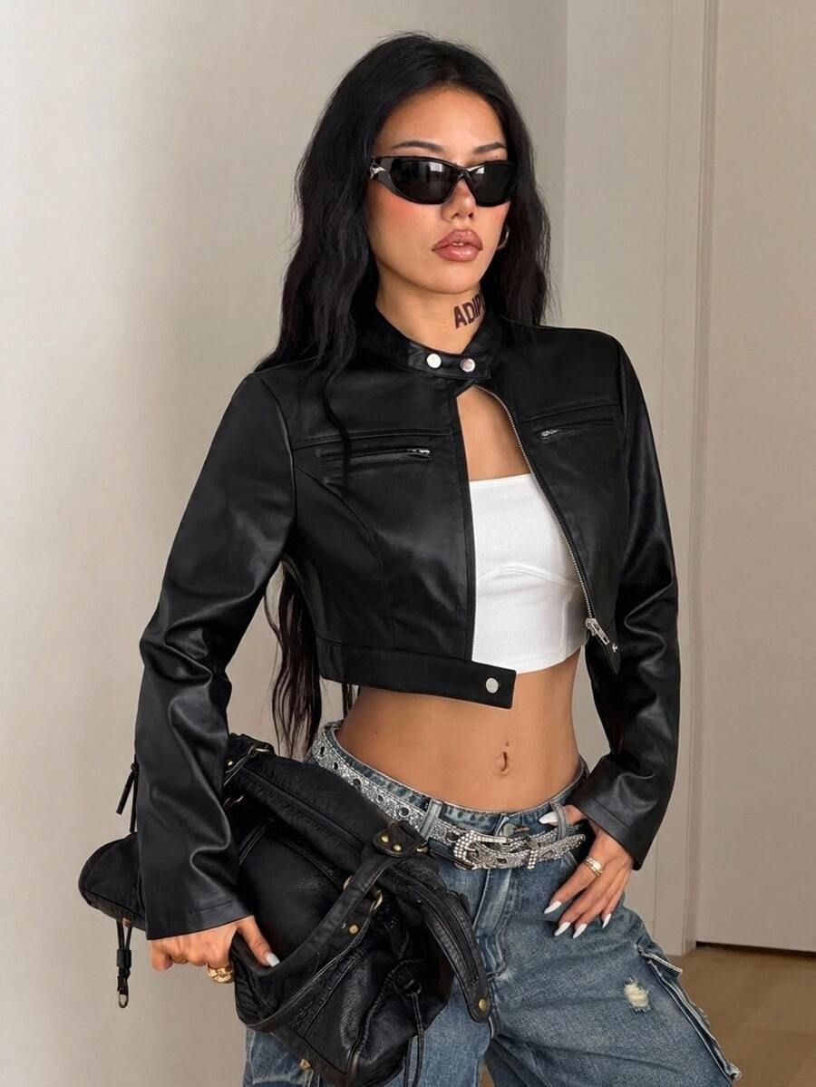 Front view of a women's black cropped PU leather jacket featuring a stand collar, long sleeves, and front zipper closure.