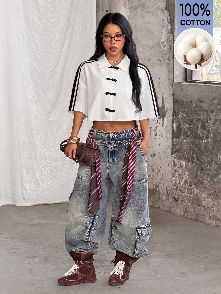 Women's plaid crop shirt with button front, chest pocket, short sleeves, and loose casual fit.