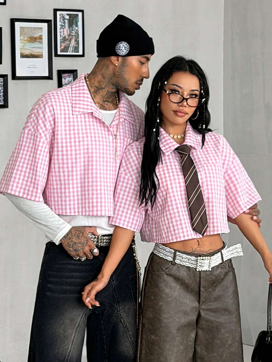 Women's plaid crop shirt with button front, chest pocket, short sleeves, and loose casual fit.