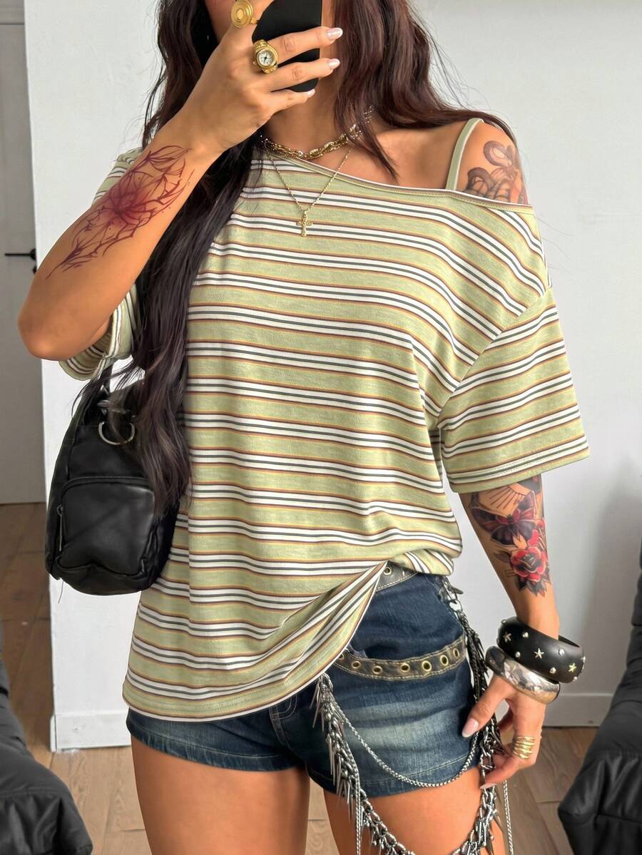 Women's casual loose fit cold shoulder cotton t-shirt with asymmetrical cutout neckline and short sleeves.