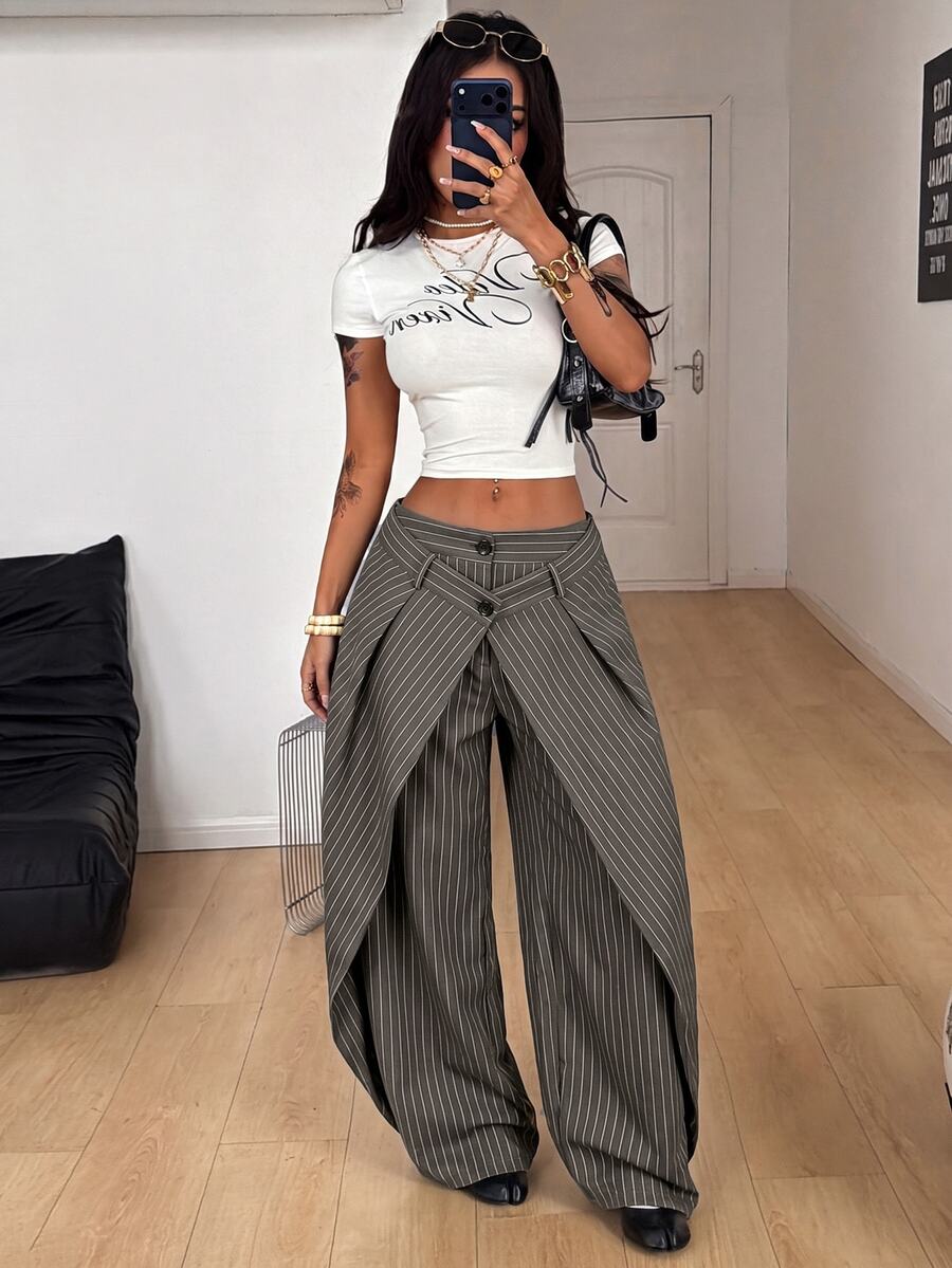 Women's loose fit pleated wide leg pants in royal blue pinstripe woven fabric with zipper fly closure.