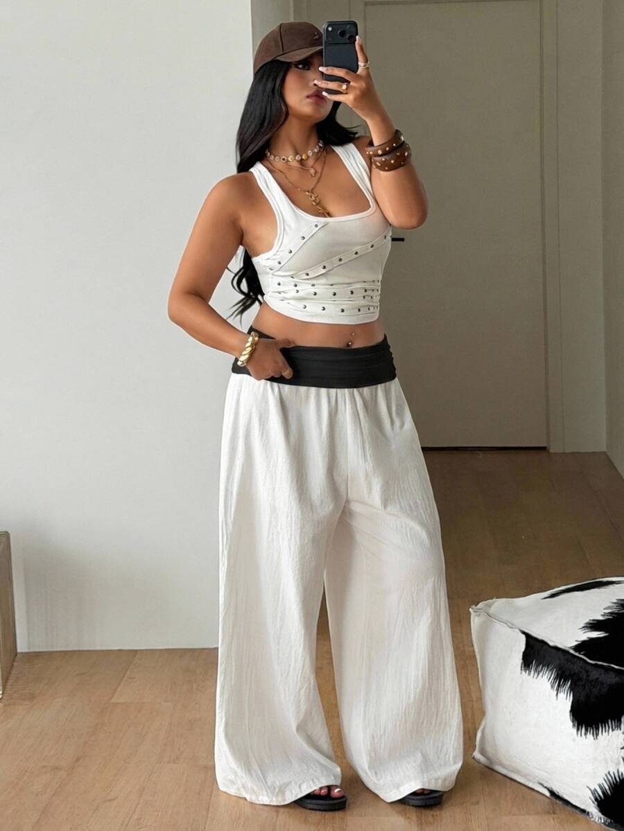 Women's plus size wide leg cotton pants featuring a relaxed loose fit and high waist design.