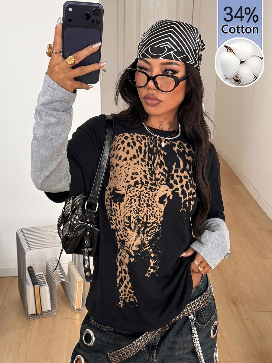 Women's casual graphic long sleeve t-shirt with a round neck, drop shoulder sleeves, and loose relaxed fit.