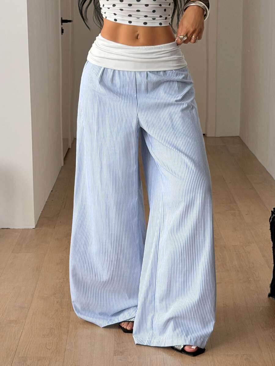 Women's plus size wide leg cotton pants featuring a relaxed loose fit and high waist design.