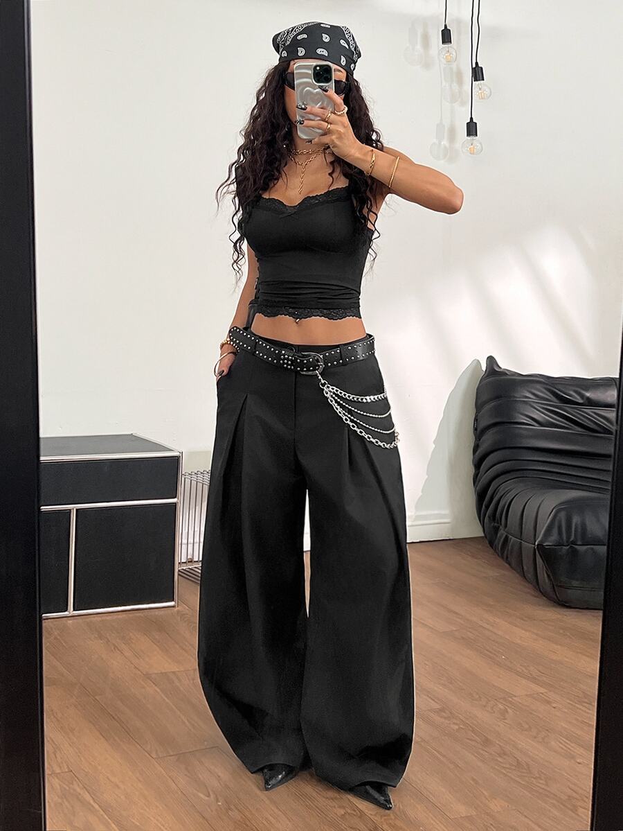 Casual black striped woven long pants for women featuring a low waist and loose fit design.