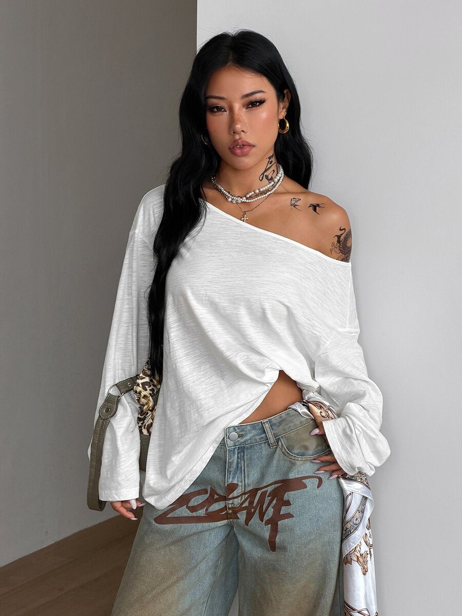 Women's brown striped boat neck long sleeve raglan T-shirt with a loose casual fit