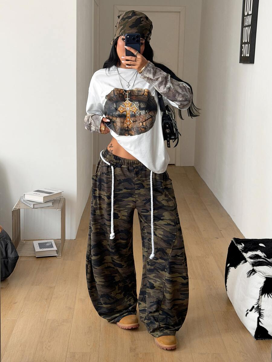 Women's casual grey plaid sweatpants featuring an elastic drawstring waistband, side pockets, and a relaxed loose fit.