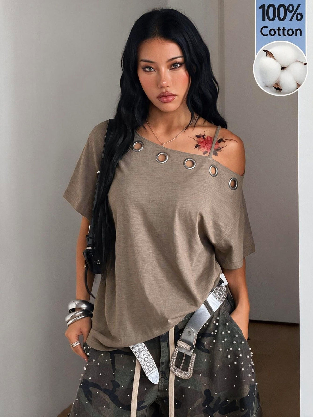 Women's casual loose fit cold shoulder cotton t-shirt with asymmetrical cutout neckline and short sleeves.