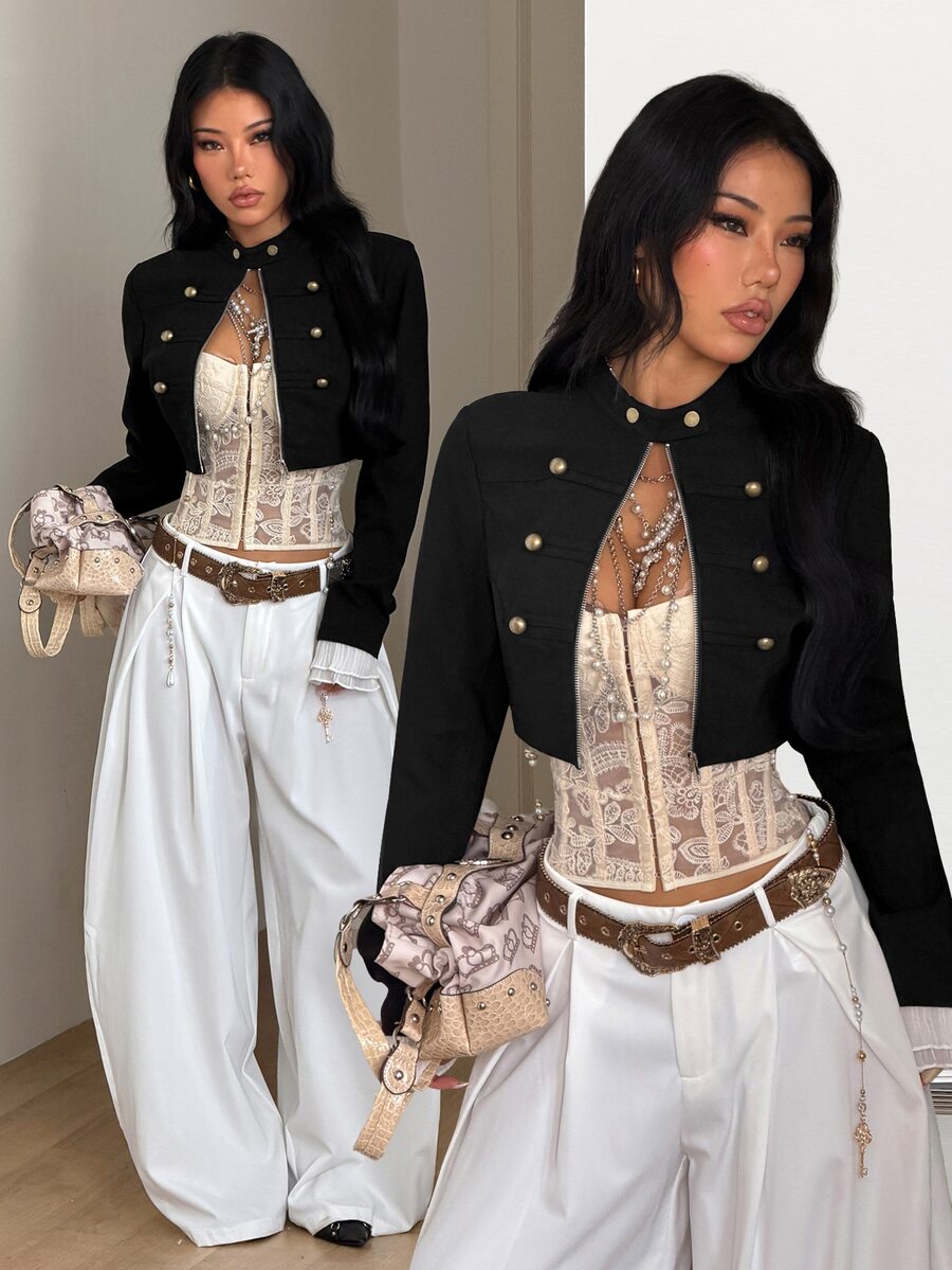 Women's metallic grey cropped faux leather jacket featuring a stand collar and asymmetrical zip front closure.