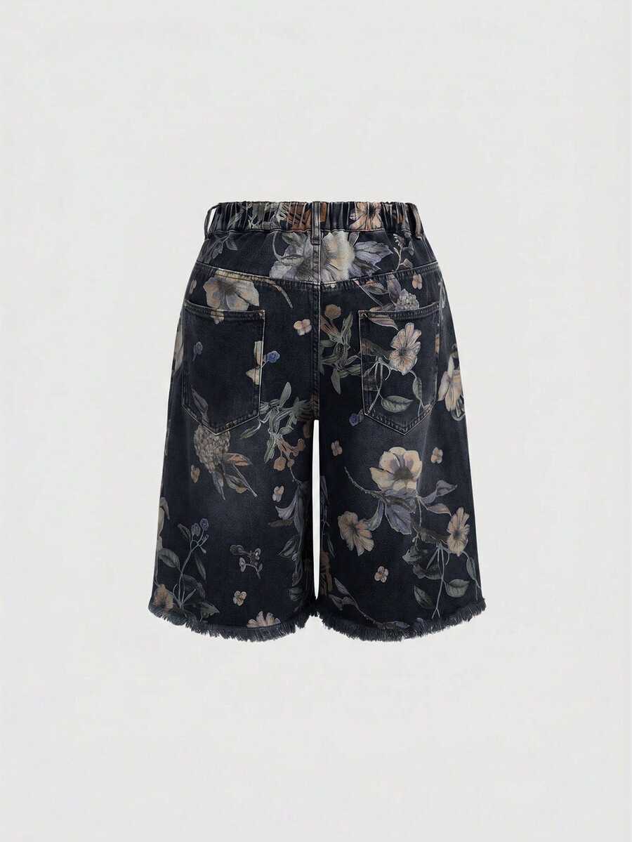 Women's loose wide-leg denim Bermuda shorts featuring vintage animal and paisley print with pockets and zipper fly.