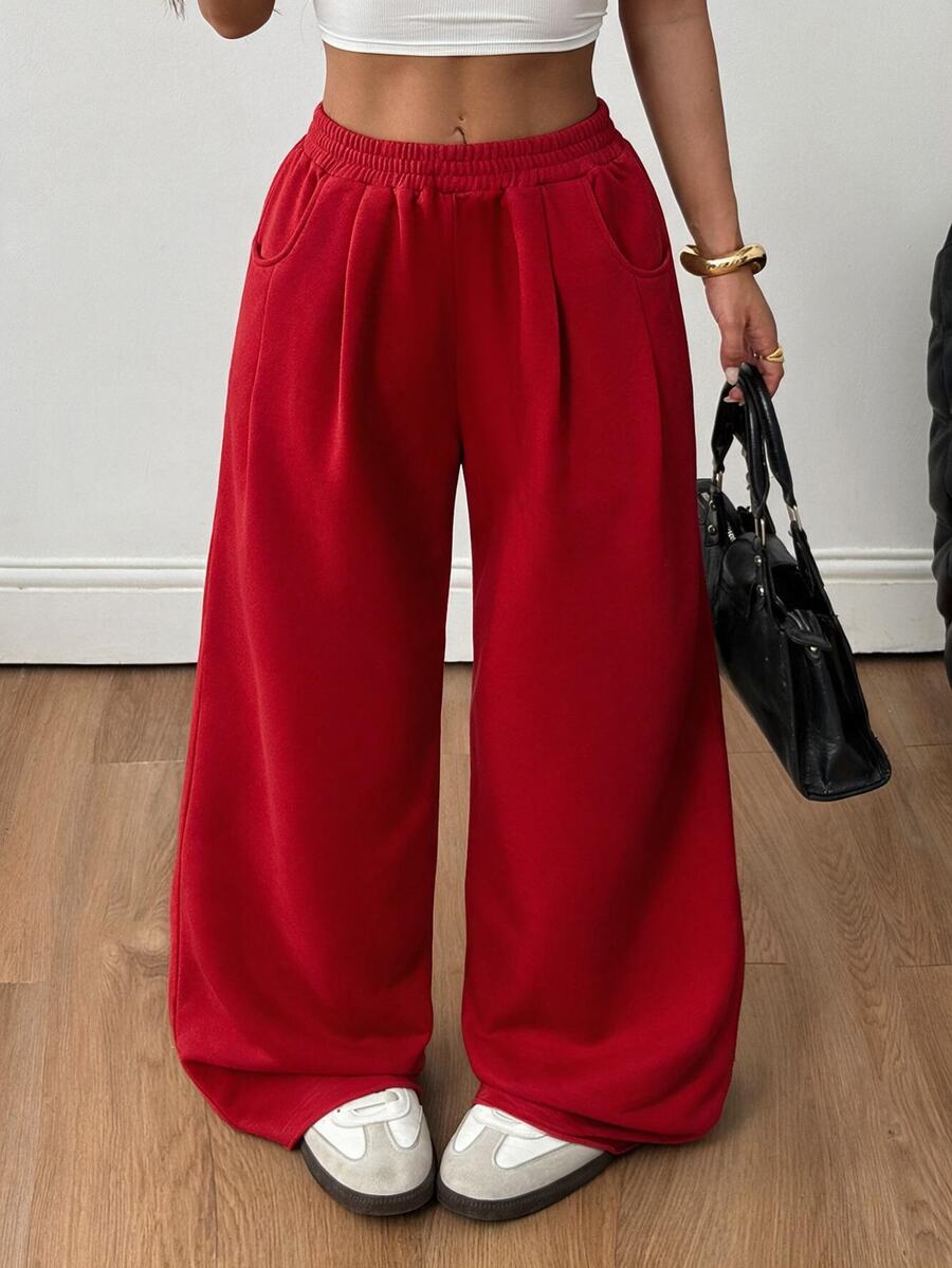 Women's loose wide leg casual sweatpants with an elastic waistband and side pockets