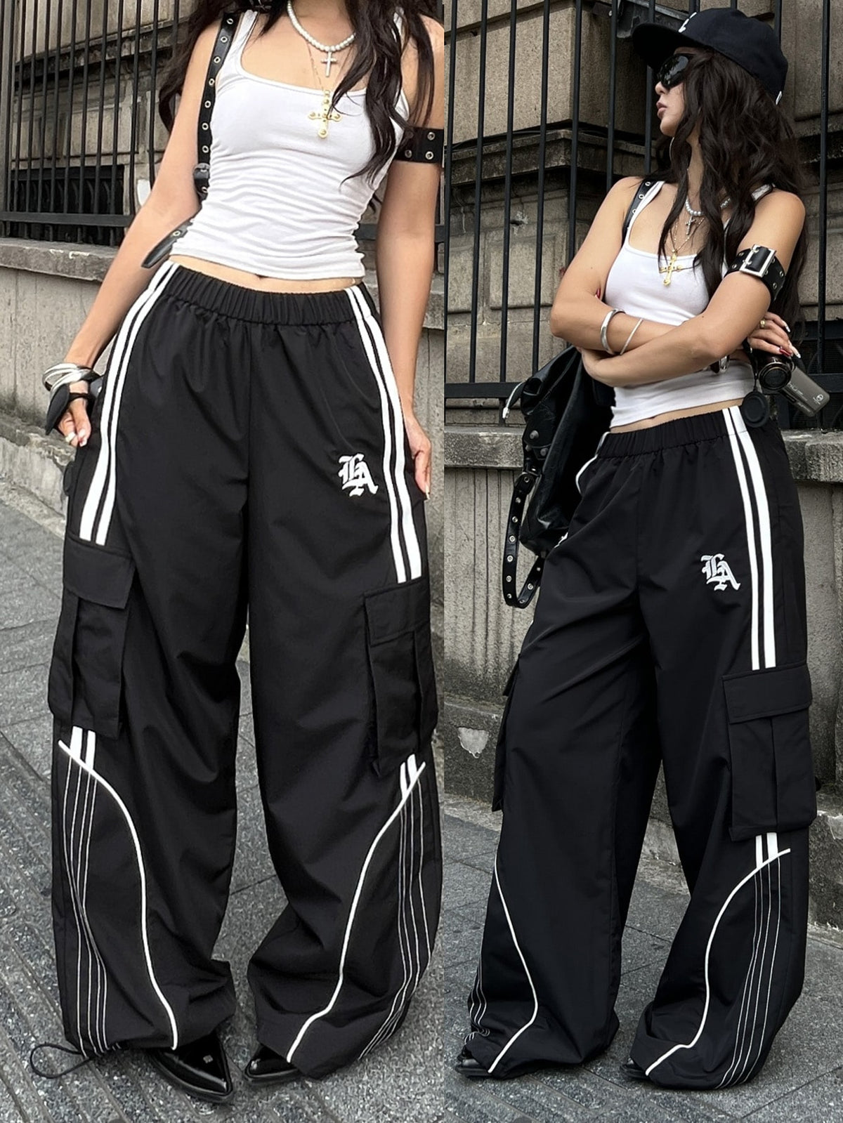 Women's plus size loose straight leg pants featuring a black and white color block design with side stripes and an elastic drawstring waist.