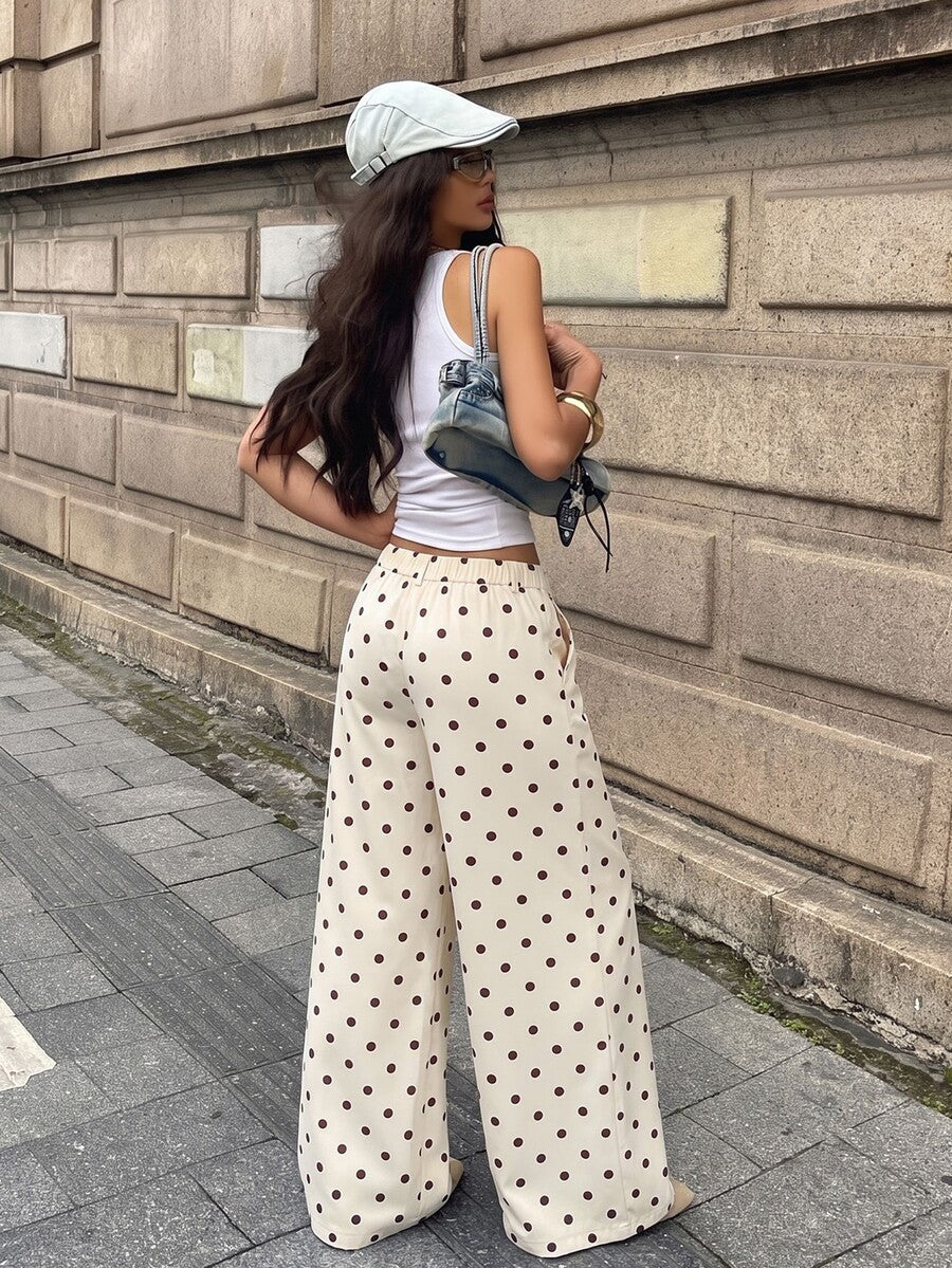 Women's casual straight leg striped woven pants featuring a low waist and zipper fly closure.