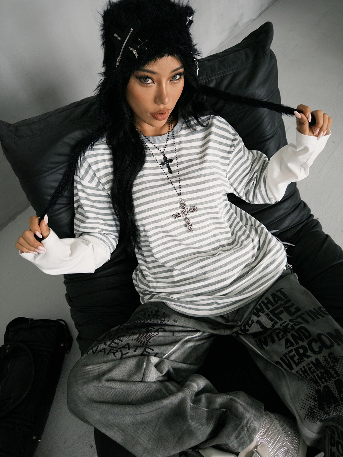 Women's casual graphic long sleeve t-shirt with a round neck, drop shoulder sleeves, and loose relaxed fit.