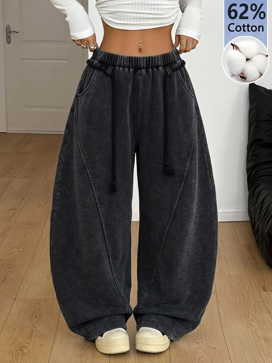 Women's casual grey plaid sweatpants featuring an elastic drawstring waistband, side pockets, and a relaxed loose fit.