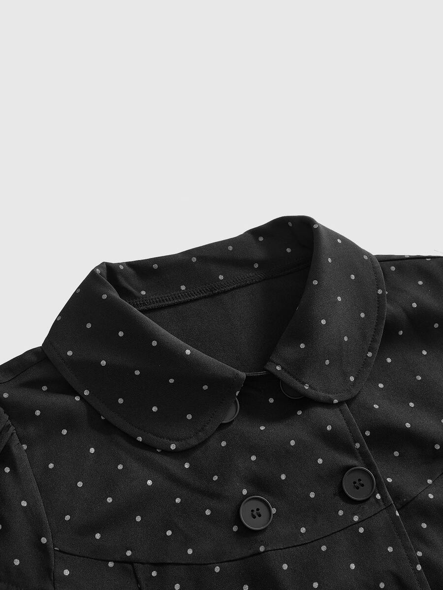 Women's short puff sleeve cotton blouse featuring a Peter Pan collar, double button detail, and front pocket.