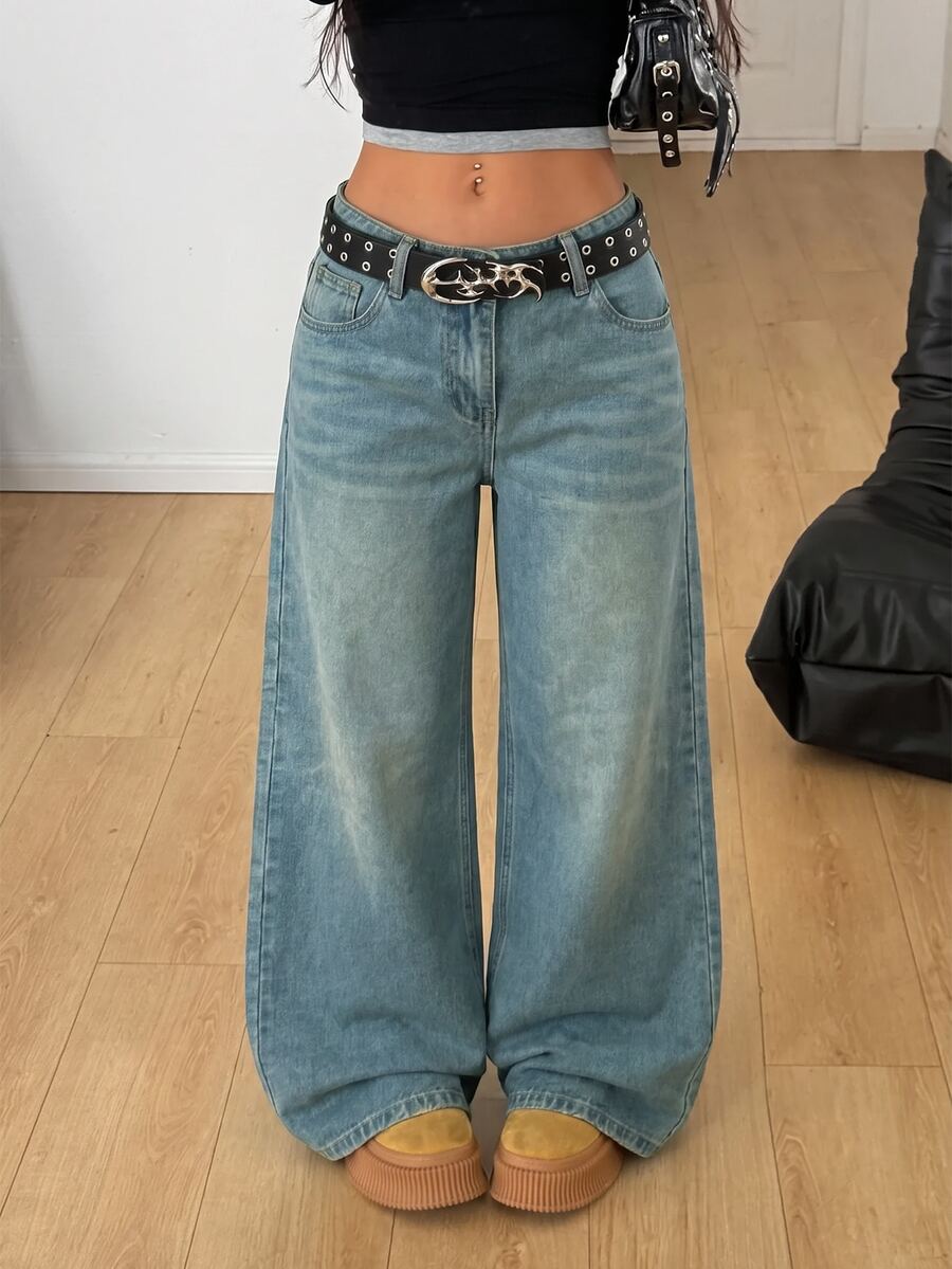 Women's loose wide-leg jeans in light wash denim with low waist and extra-long relaxed fit