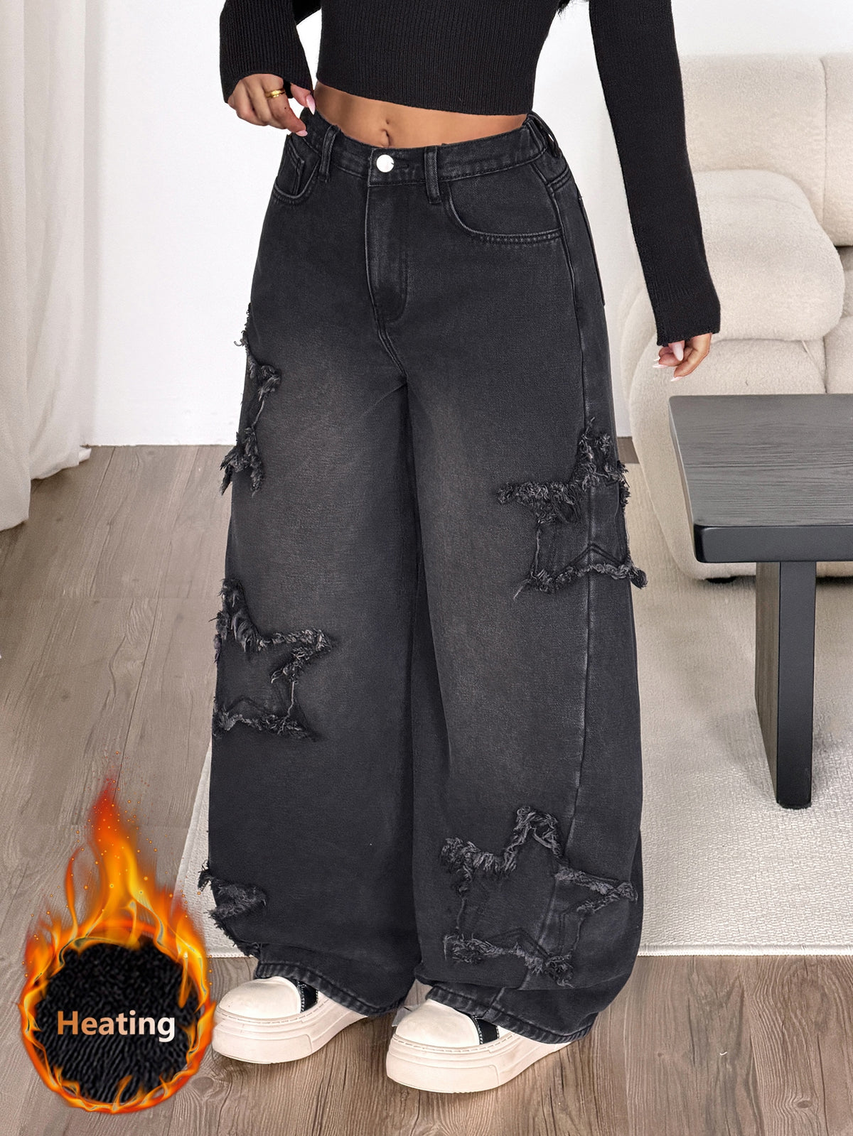 Front view of women's loose wide leg denim jeans featuring a mid waist, classic front pockets, and a zipper fly closure.