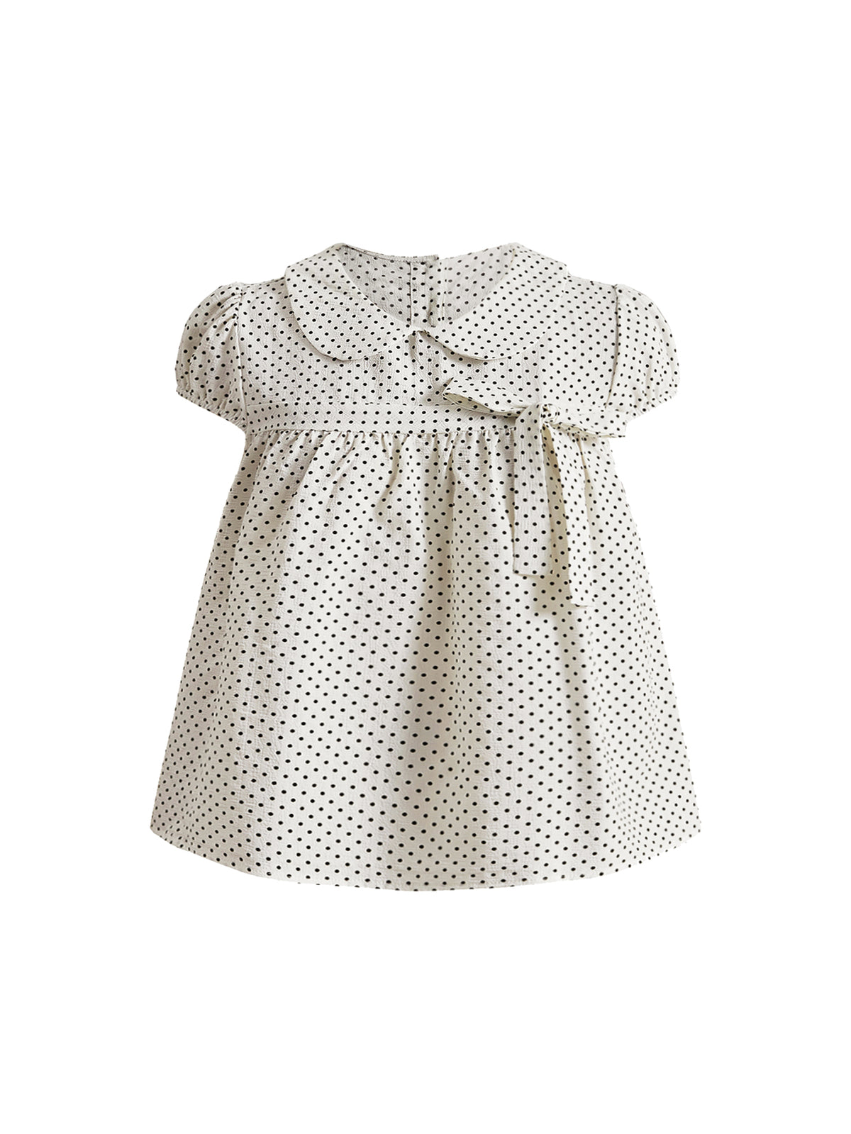 Short sleeve plaid shirt for women featuring a Peter Pan collar with a bow accent, puff sleeves, and a flared hem.