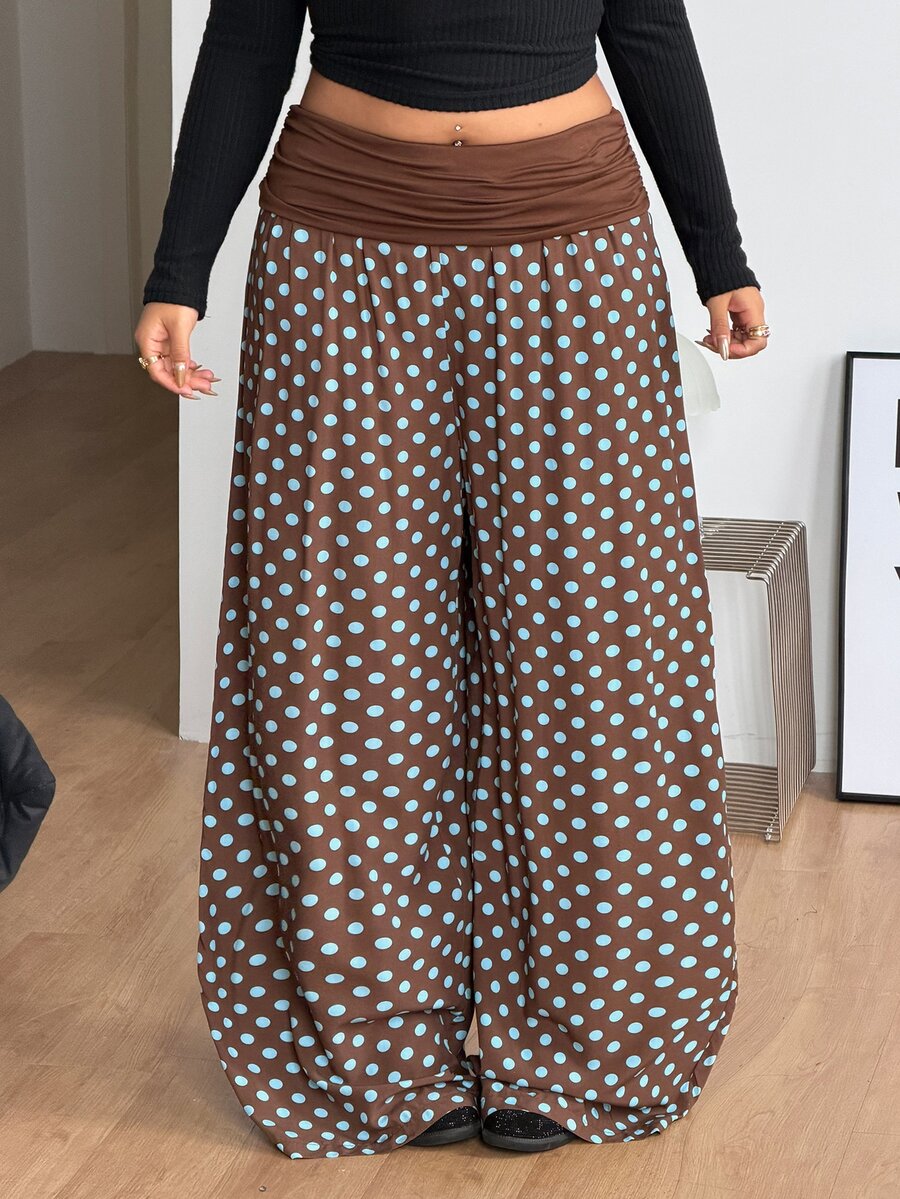 Women's plus size wide leg cotton pants featuring a relaxed loose fit and high waist design.