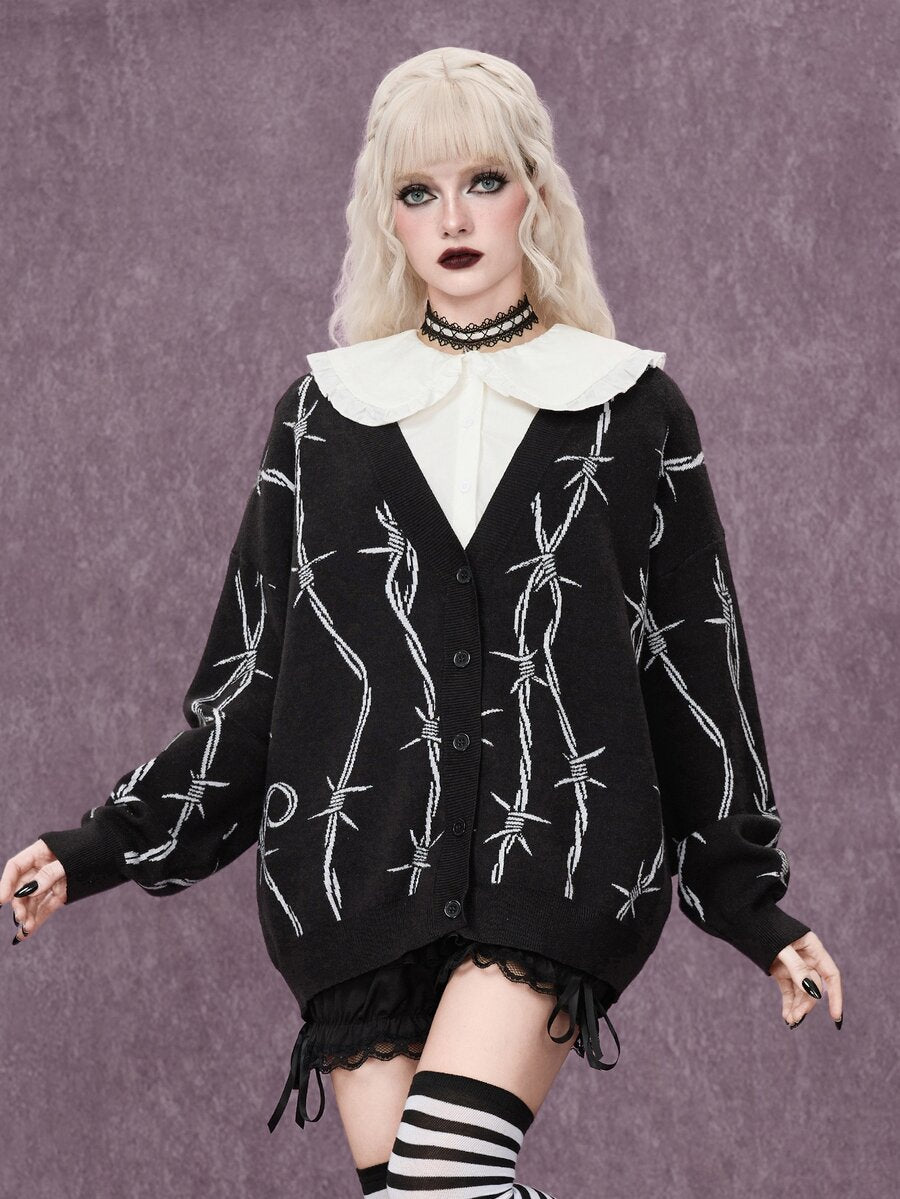 Women's oversized gothic thorn jacquard knit cardigan with V-neckline, button-front closure, and long drop-shoulder sleeves.