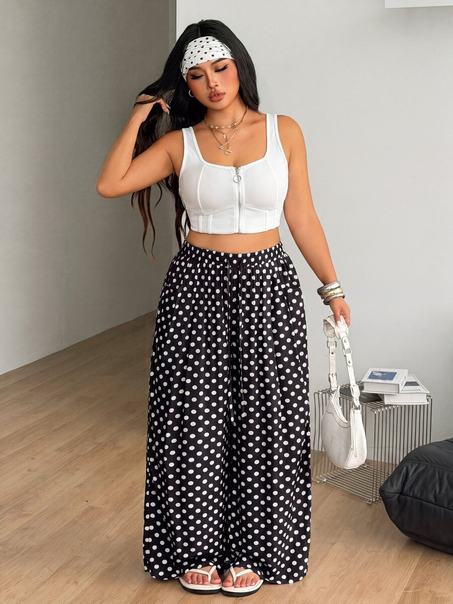 Plus size women's striped loose straight leg cropped pants with pleated detailing and side pockets