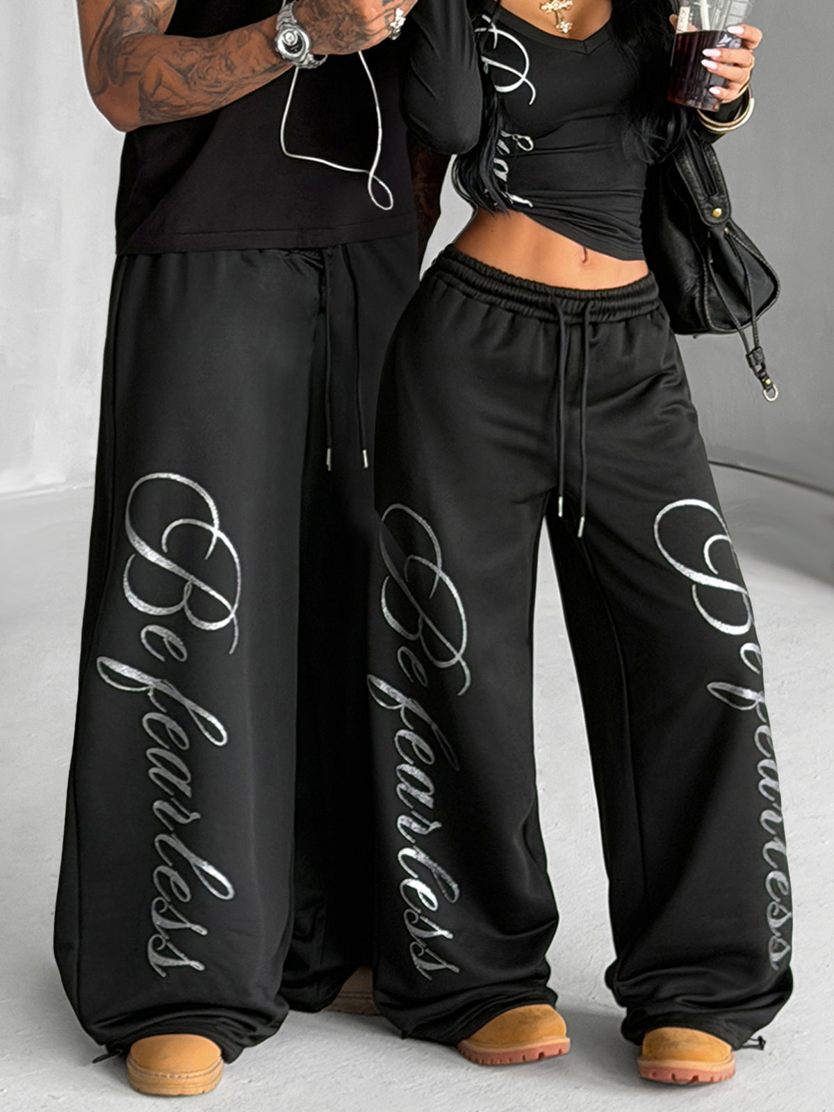 Women's wide leg trousers with a tree branch graphic pattern, loose fit, and mid-rise waist in woven fabric.