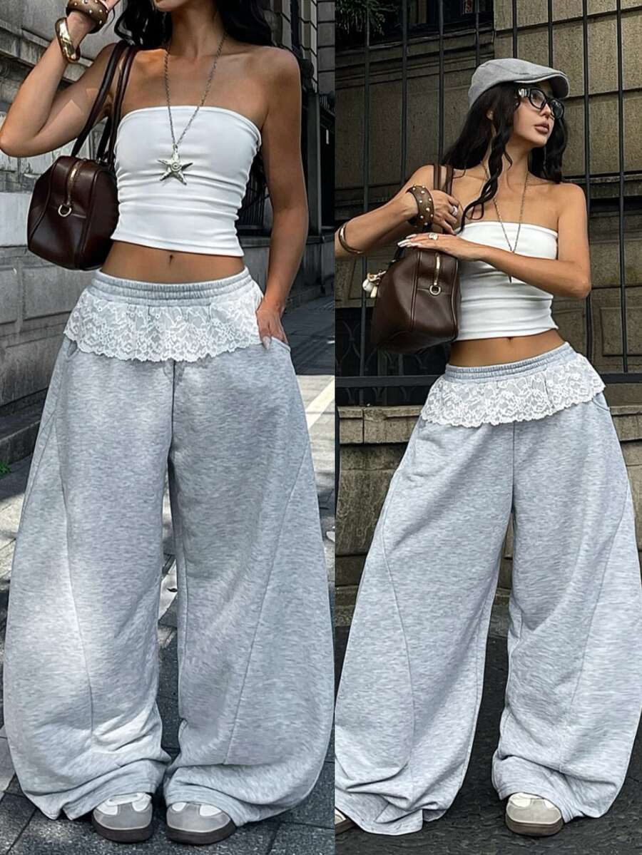 Women's casual grey plaid sweatpants featuring an elastic drawstring waistband, side pockets, and a relaxed loose fit.