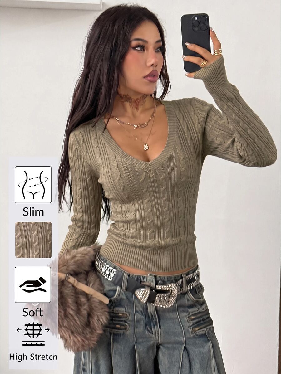 Women's slim fit cable-knit sweater with a V-neckline and long sleeves in solid green rib knit fabric.