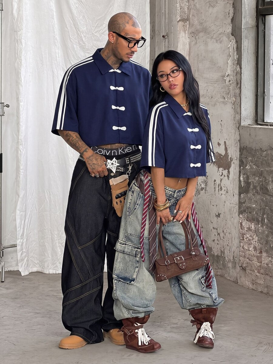 Women's plaid crop shirt with button front, chest pocket, short sleeves, and loose casual fit.
