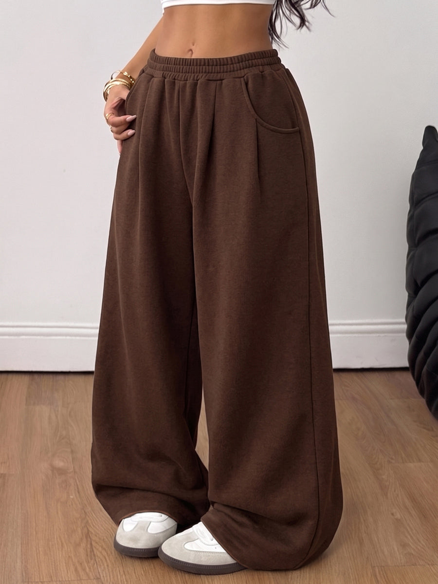 Women's loose wide leg casual sweatpants with an elastic waistband and side pockets