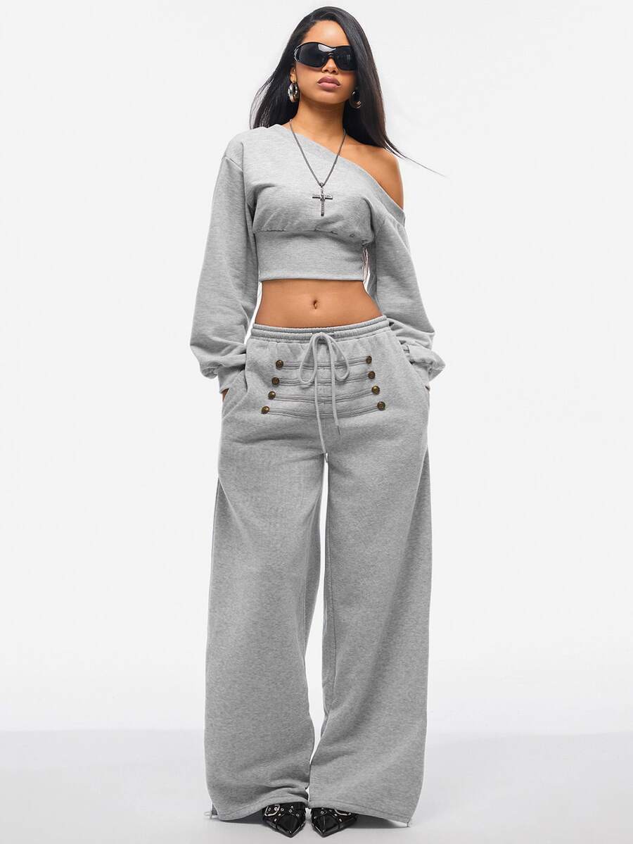 Women's wide leg trousers with a tree branch graphic pattern, loose fit, and mid-rise waist in woven fabric.