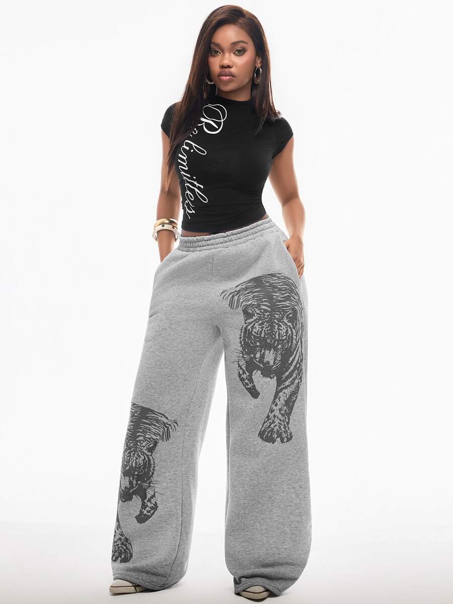 Women's striped straight leg casual trousers with elastic mid waist and side pockets