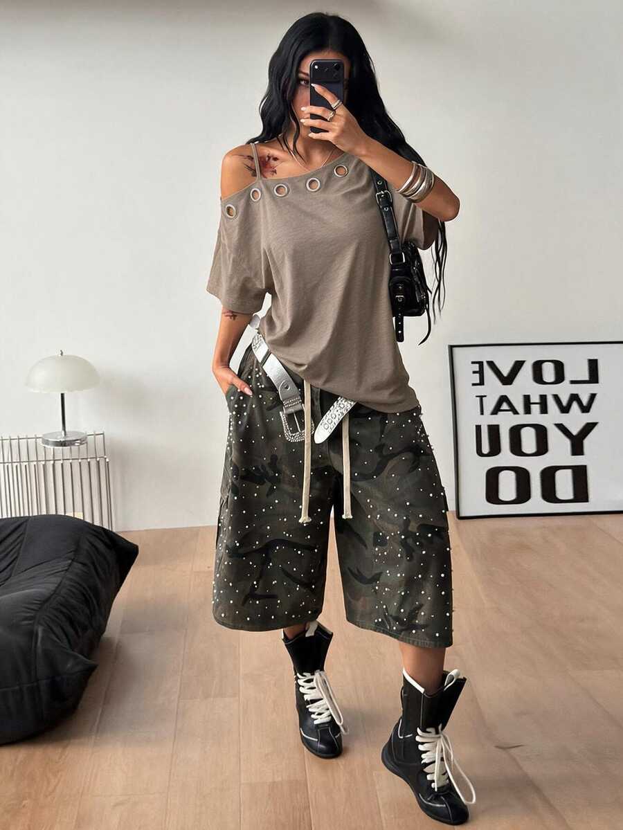Women's casual loose fit cold shoulder cotton t-shirt with asymmetrical cutout neckline and short sleeves.