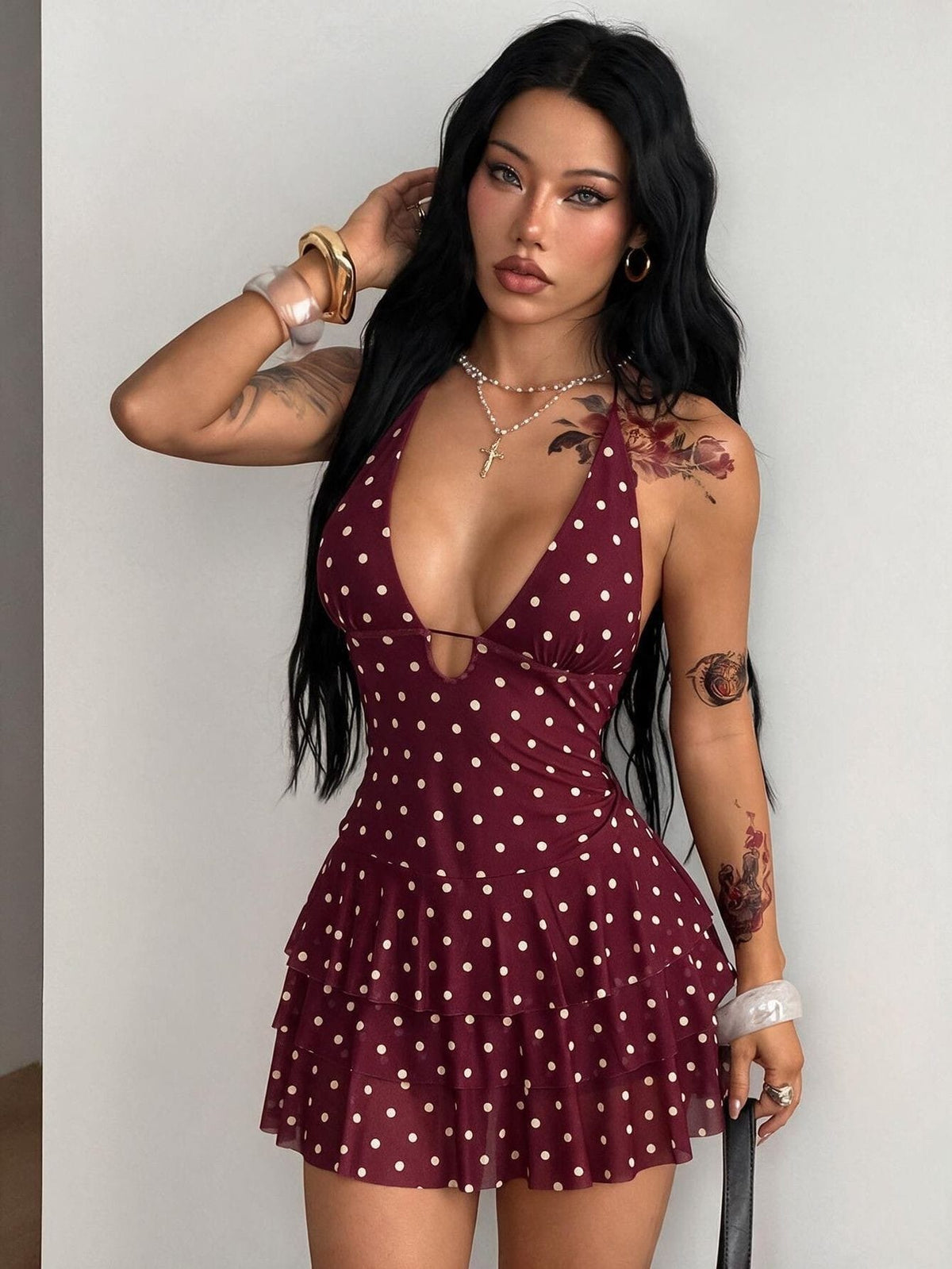 Front view of a women's lace halter mini dress featuring a slim-fit bodice, flared hem, and sleeveless design.