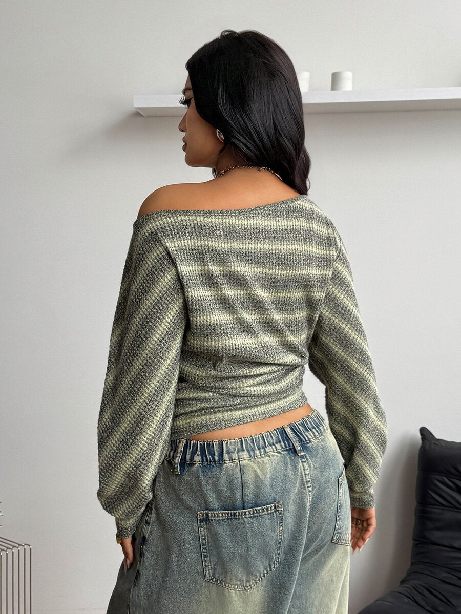 Plus size women's striped rib-knit long sleeve t-shirt featuring an asymmetrical neckline and ruched accents.
