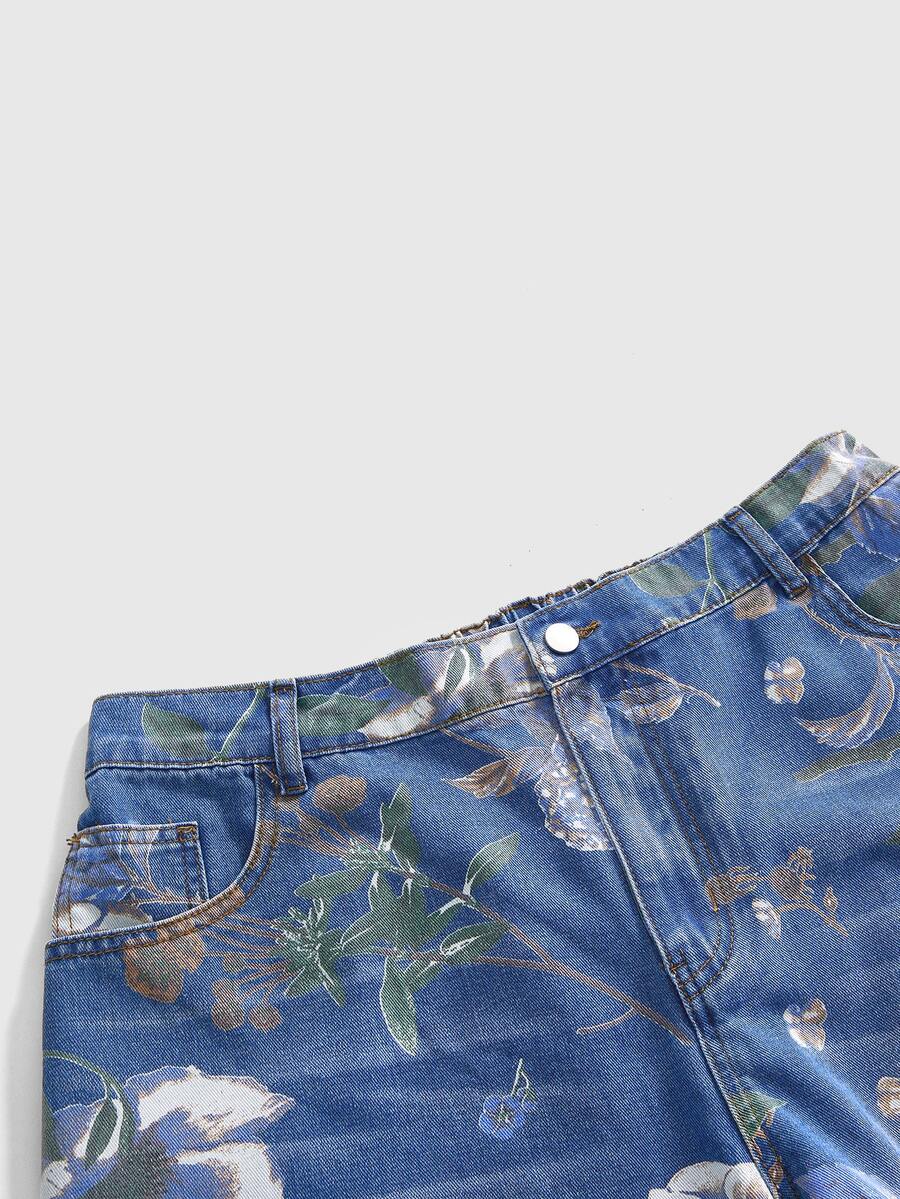 Women's loose wide-leg denim Bermuda shorts featuring vintage animal and paisley print with pockets and zipper fly.