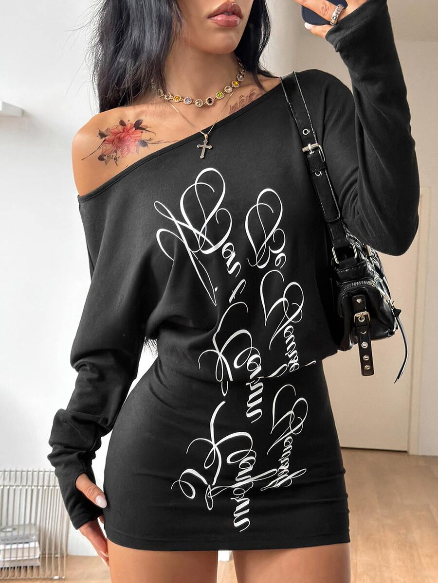 Women's long sleeve bodycon mini dress in black knitted fabric with an asymmetrical neckline and ruched accents.