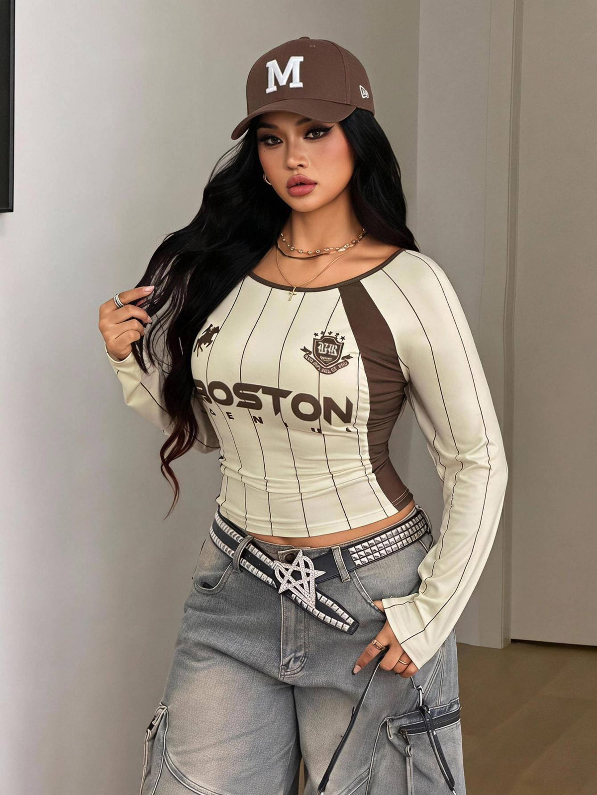 Women's plus size black and white colorblock long sleeve t-shirt with raglan sleeves and scoop neckline.