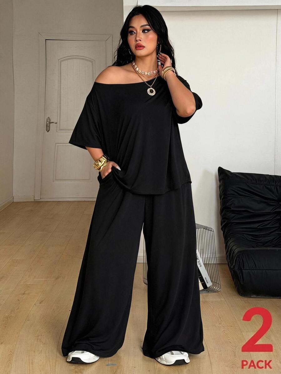 Women's two-piece lounge set featuring a loose drop shoulder asymmetrical neck short sleeve t-shirt and wide-leg knit pants with pockets.