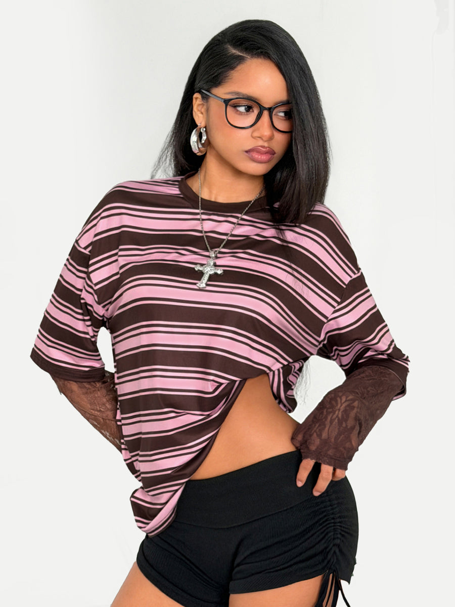 Women's casual graphic long sleeve t-shirt with a round neck, drop shoulder sleeves, and loose relaxed fit.