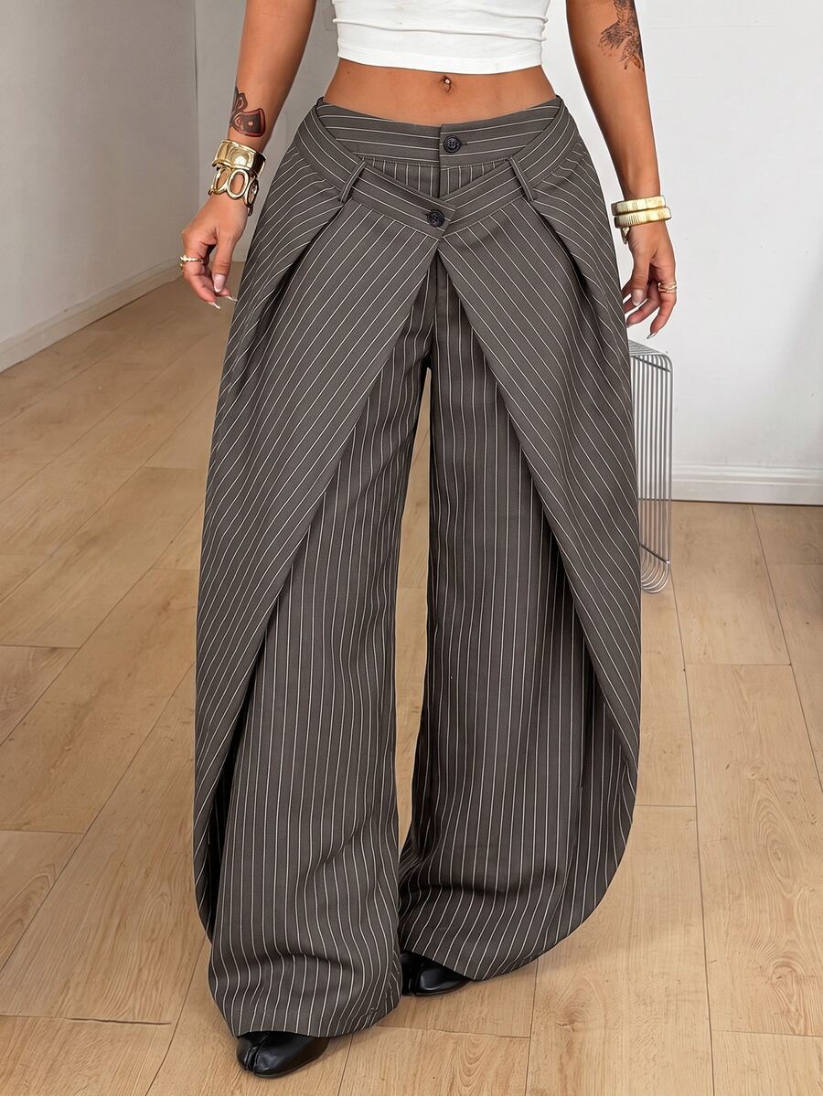 Women's loose fit pleated wide leg pants in royal blue pinstripe woven fabric with zipper fly closure.