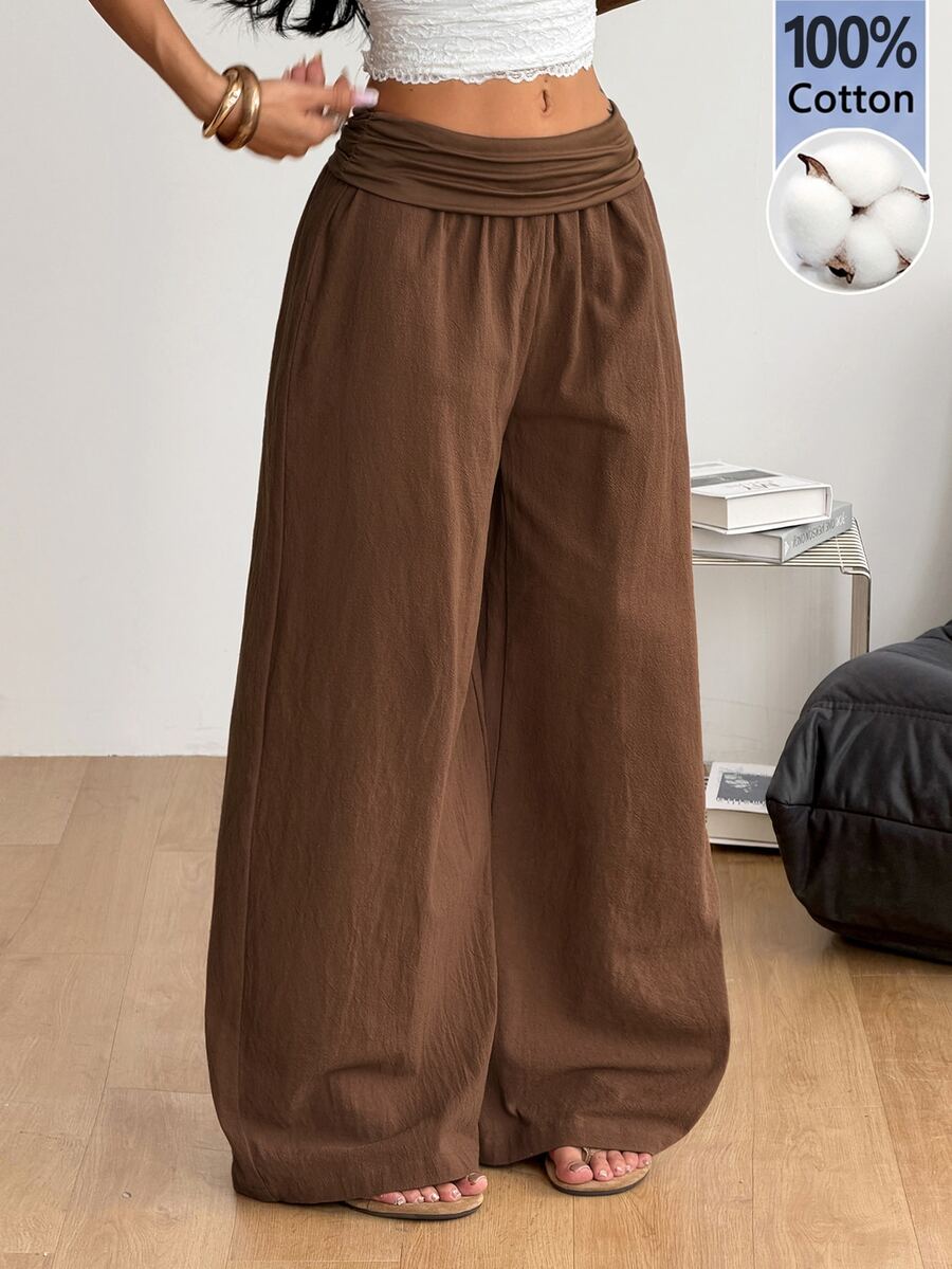 Women's plus size wide leg cotton pants featuring a relaxed loose fit and high waist design.