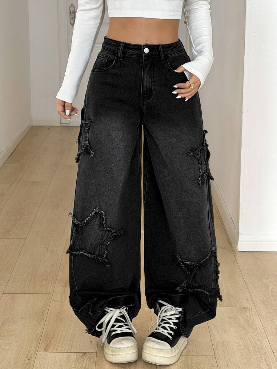 Front view of women's loose wide leg denim jeans featuring a mid waist, classic front pockets, and a zipper fly closure.