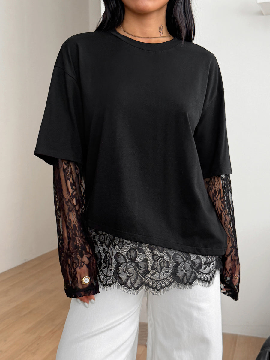 Women's casual graphic long sleeve t-shirt with a round neck, drop shoulder sleeves, and loose relaxed fit.