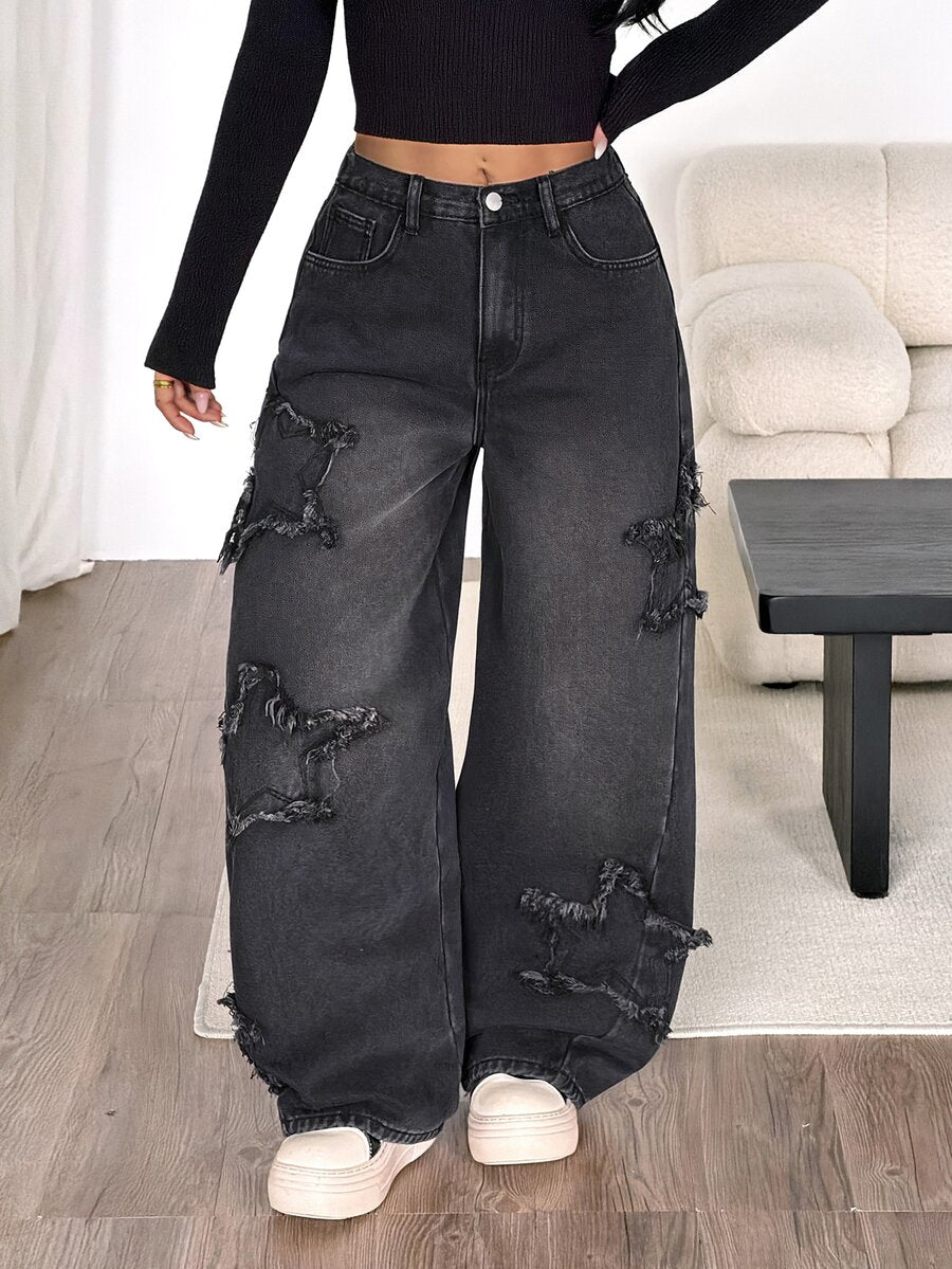 Front view of women's loose wide leg denim jeans featuring a mid waist, classic front pockets, and a zipper fly closure.