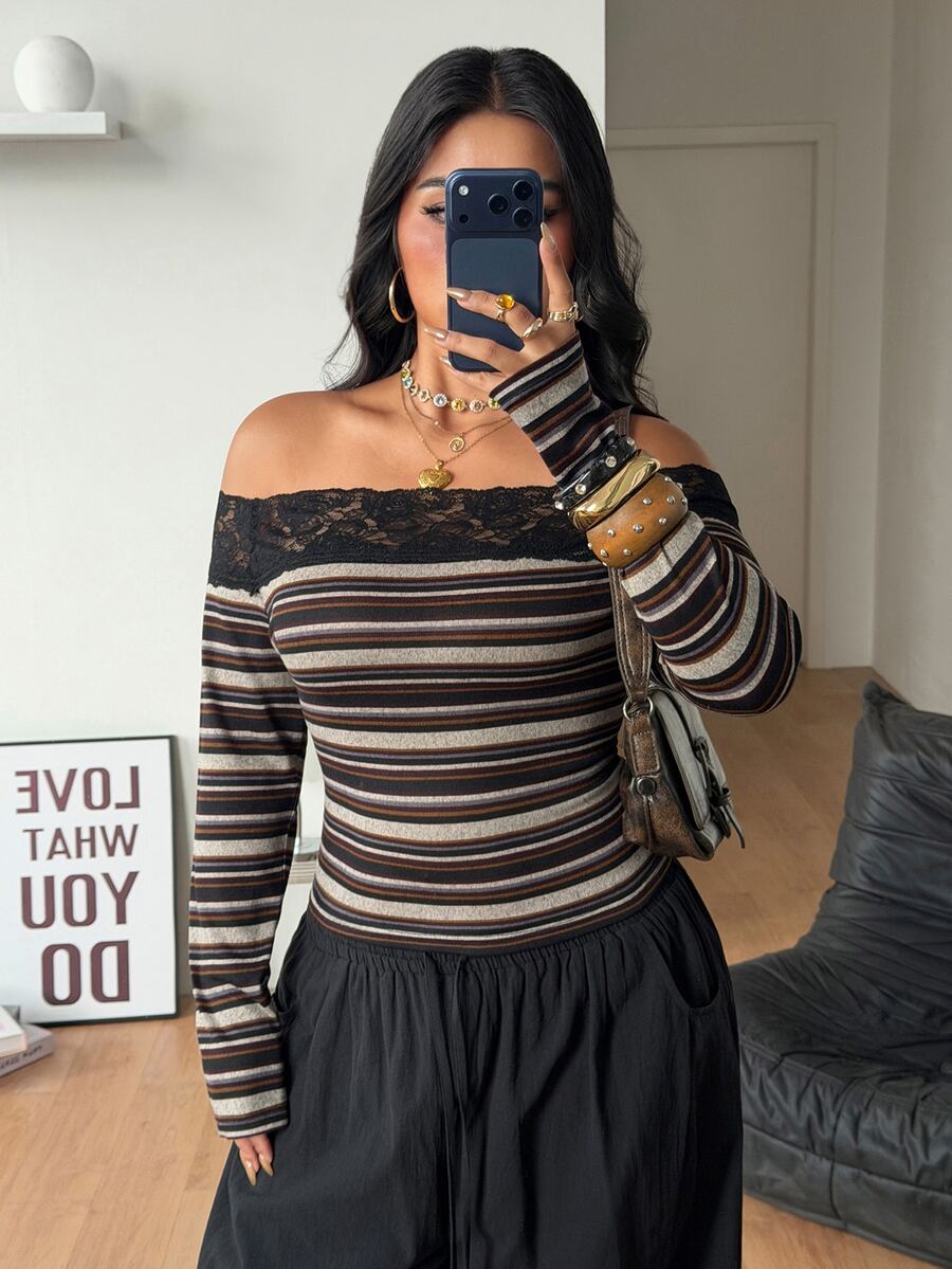 Women's striped off the shoulder long-sleeve top with contrast lace trim and ribbed knit texture.