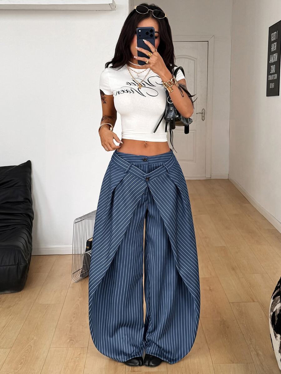 Women's loose fit pleated wide leg pants in royal blue pinstripe woven fabric with zipper fly closure.