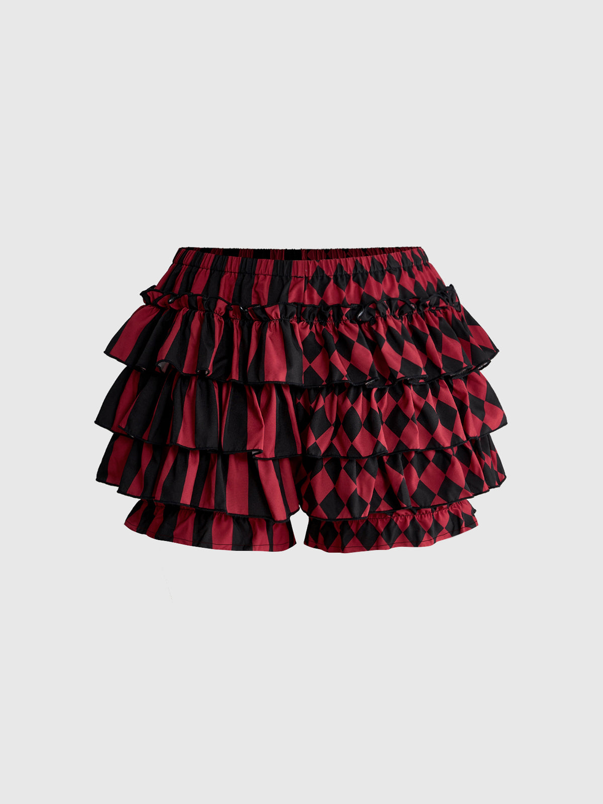 Women's gothic patchwork pumpkin shorts with tiered ruffle hem and geometric striped plaid pattern.