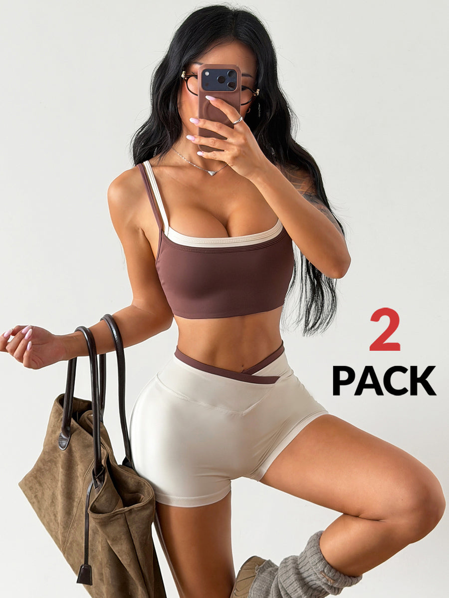 Women's two-piece brown workout set featuring a backless spaghetti strap crop top with contrast trim and matching athletic shorts.